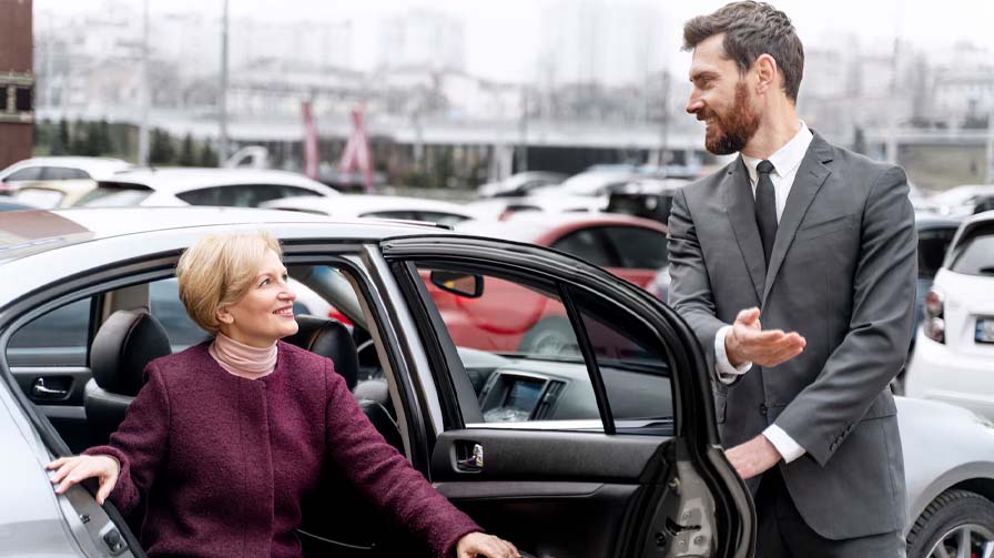 A customer exiting a boxall taxis car